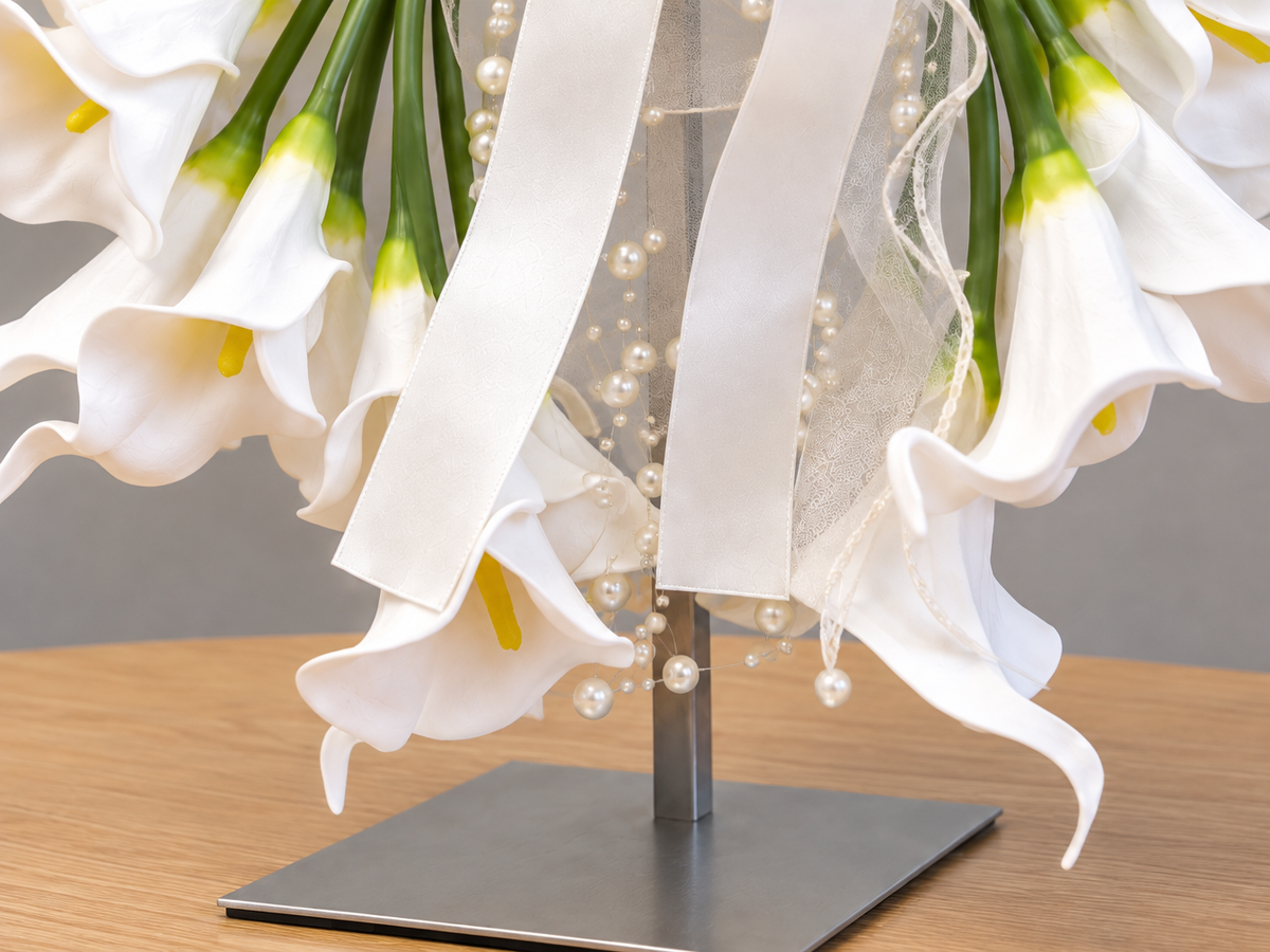 Tori ivory ribbons and cascading pearl strands